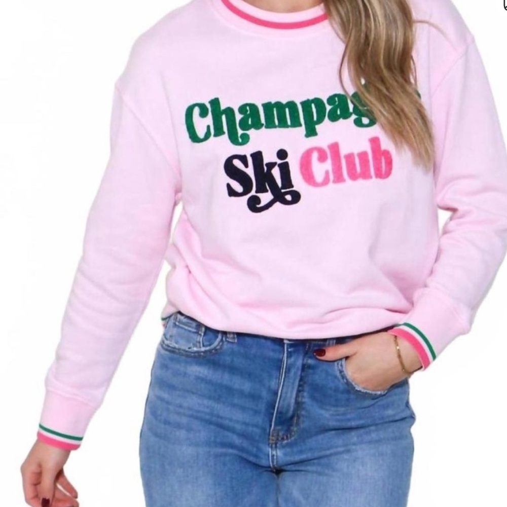 Shiraleay pink Apres Ski Champagne Ski Club sweatshirt.